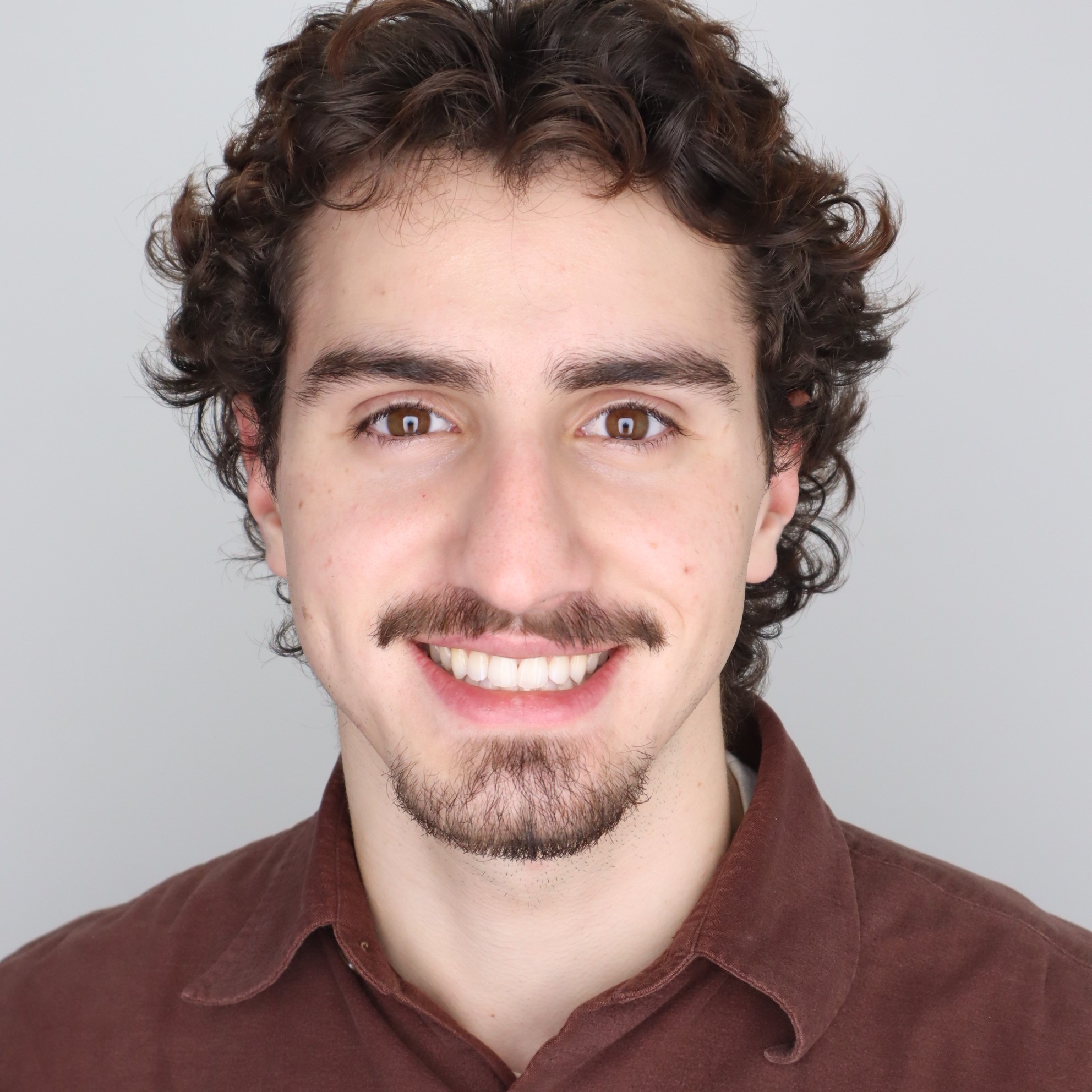 headshot_KellerVirgilio_edited.jpg
